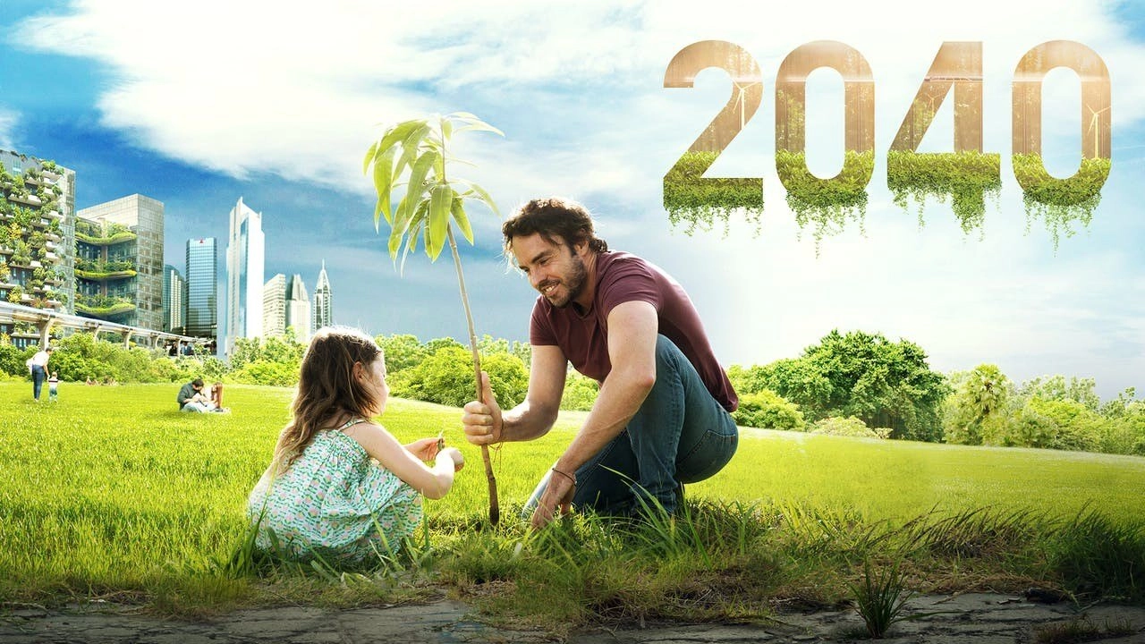 Cartell del documental 2040, al que apareix un pare i la seua filla plantant un àrbre en una ciutat del futur